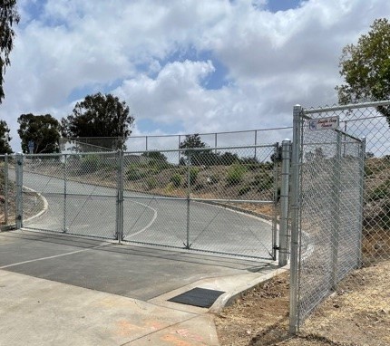 Chain link double swing gate on driveway