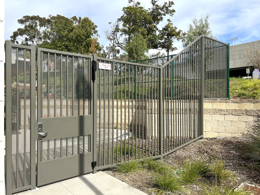Custom iron gate with security mesh