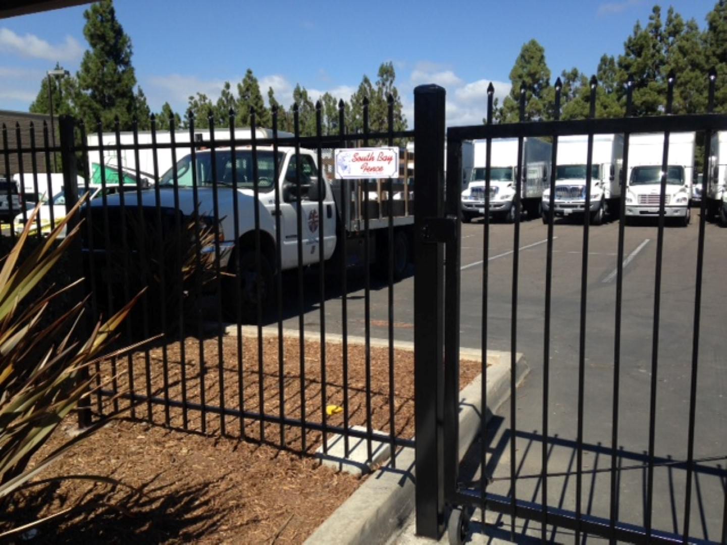 Custom iron picket fence