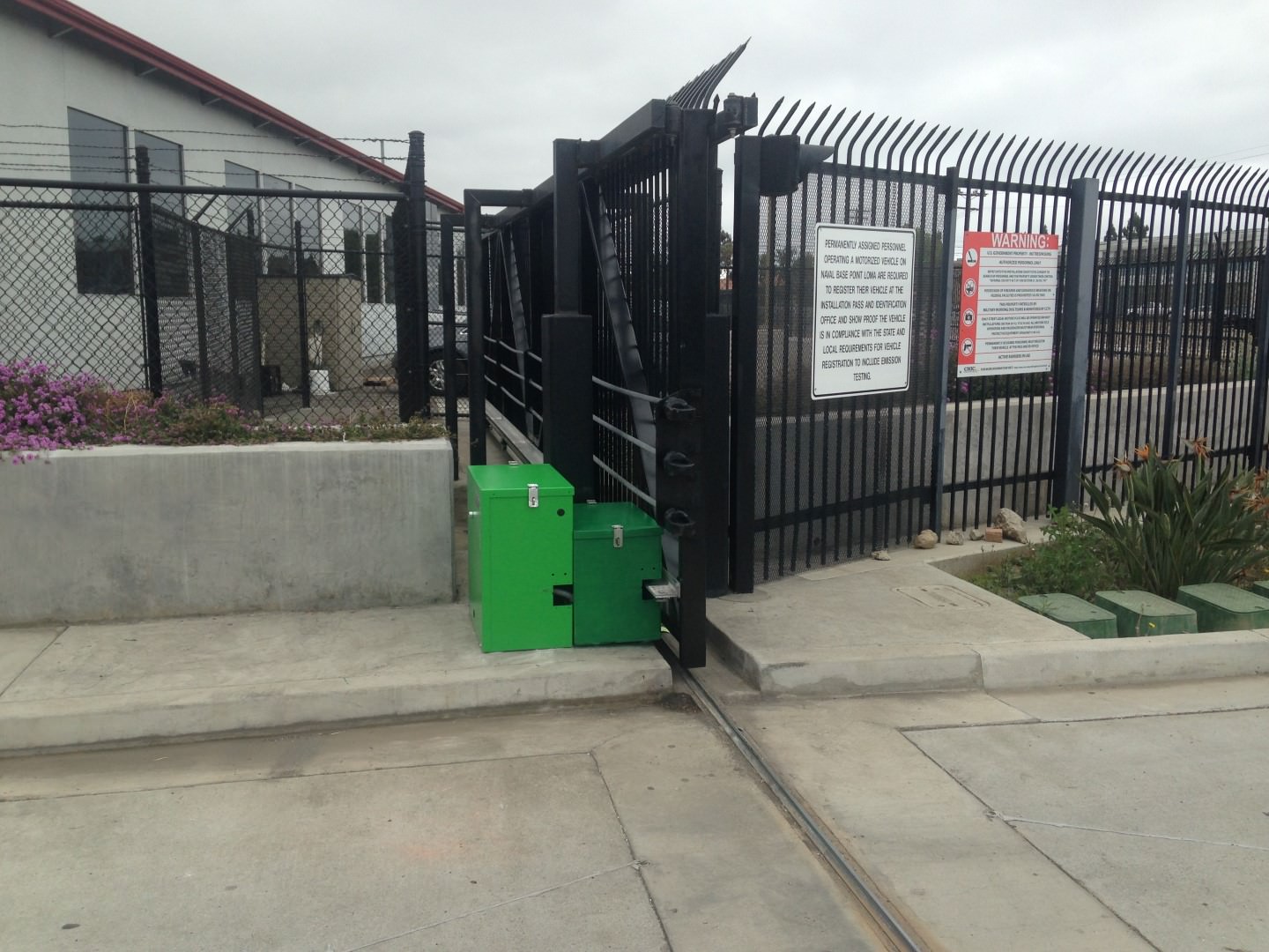 Iron gate with operator