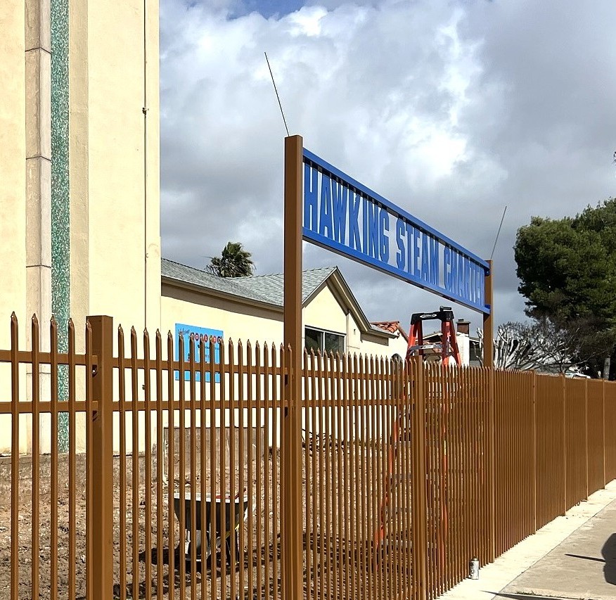 Hawking Steam Charter school iron fence entrance