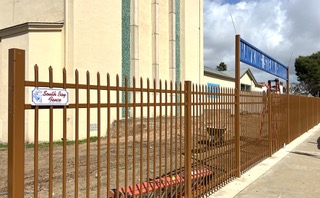 Custom iron fence for school entrance