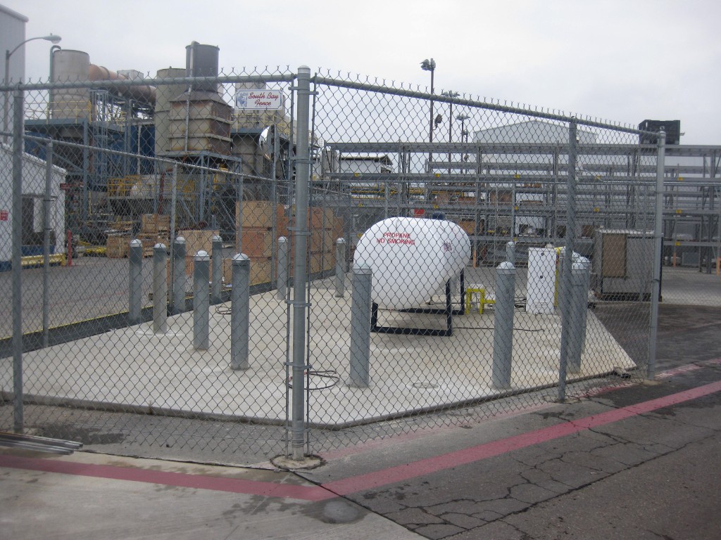 Steel bollards protecting secured equipment