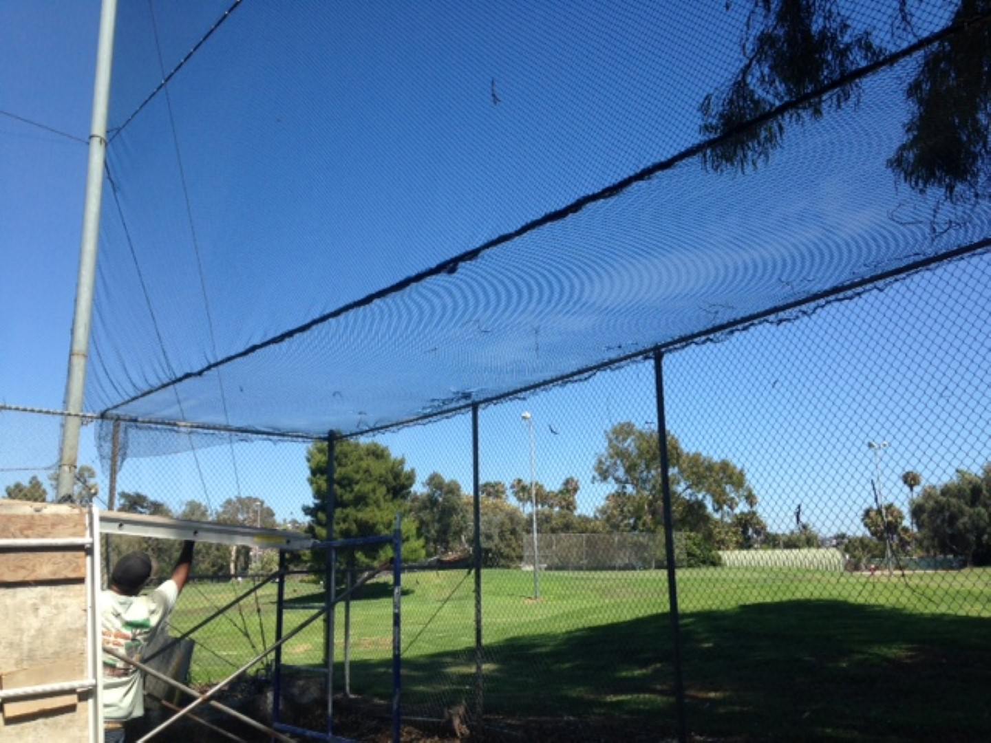 Batting cage fence installation