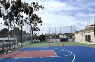 Chain link basketball court fence