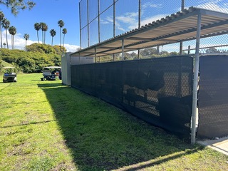 Chain link dugout with shade cloth