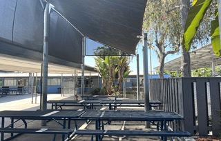 Outdoor shade cover over picnic area