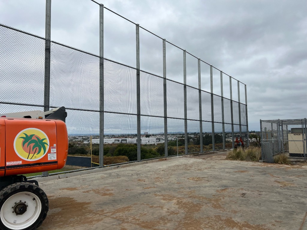Sports field chain link fence