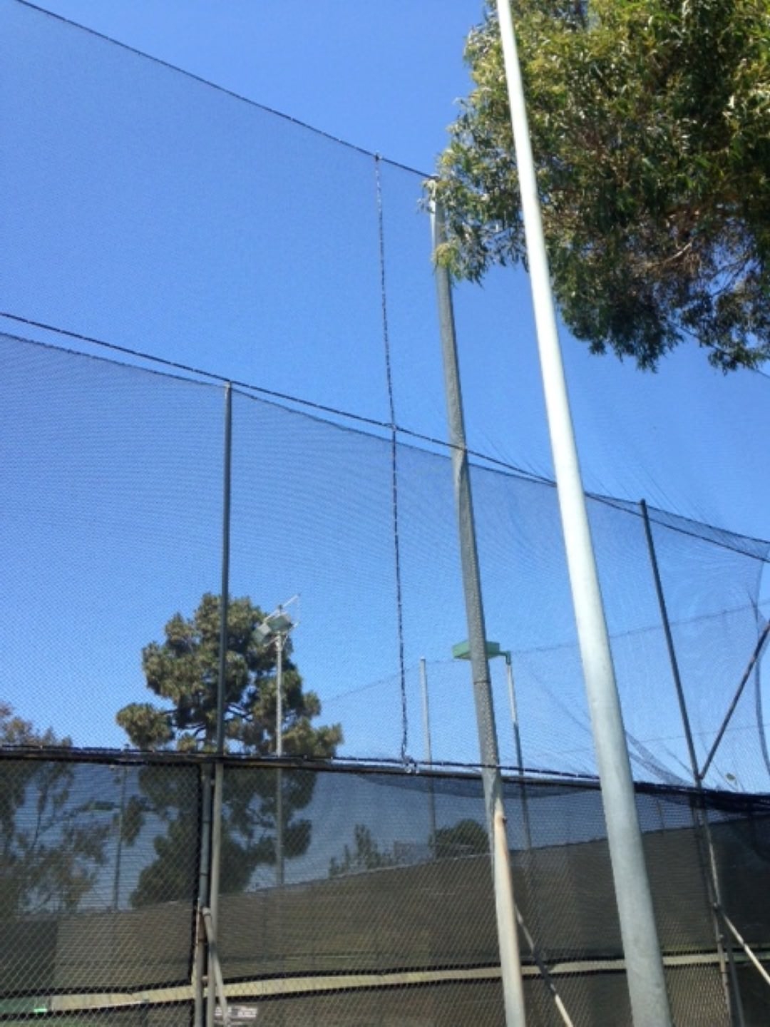 Tennis court fence and netting